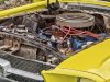 car with bonnet open showing motor